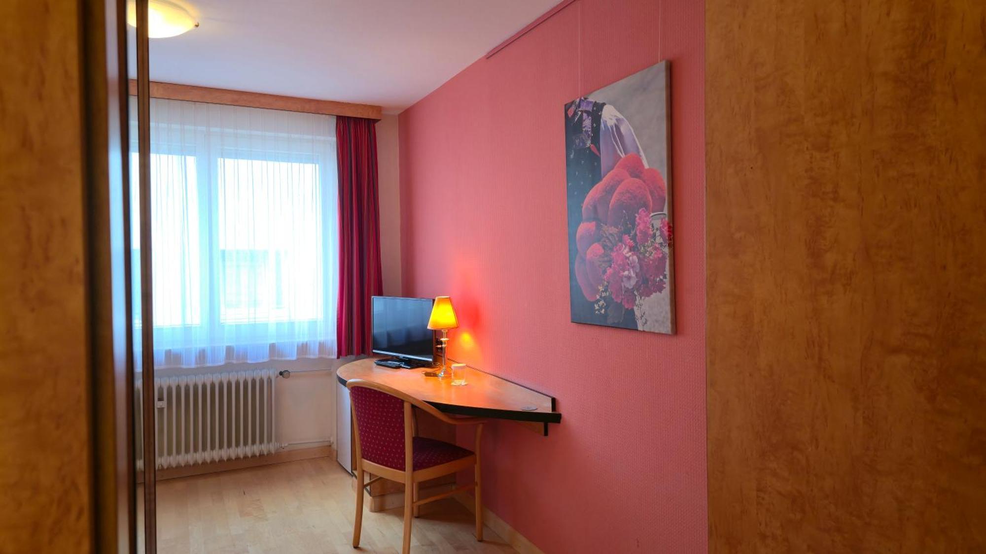 Boardinghouse Sonne Hotel Ofemburgo Quarto foto